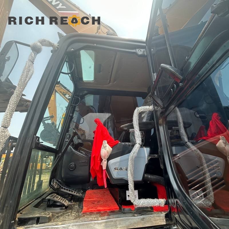 Heavy-duty undercarriage and track shoes of a 2020 SANY 215H excavator priced at $31,944